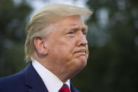 President Donald Trump listens to a question as he speaks with reporters before departing on Marine One from the South Lawn of the White House, Thursday, Sept. 12, 2019, in Washington. Trump is en route to Baltimore.(AP Photo/Alex Brandon)