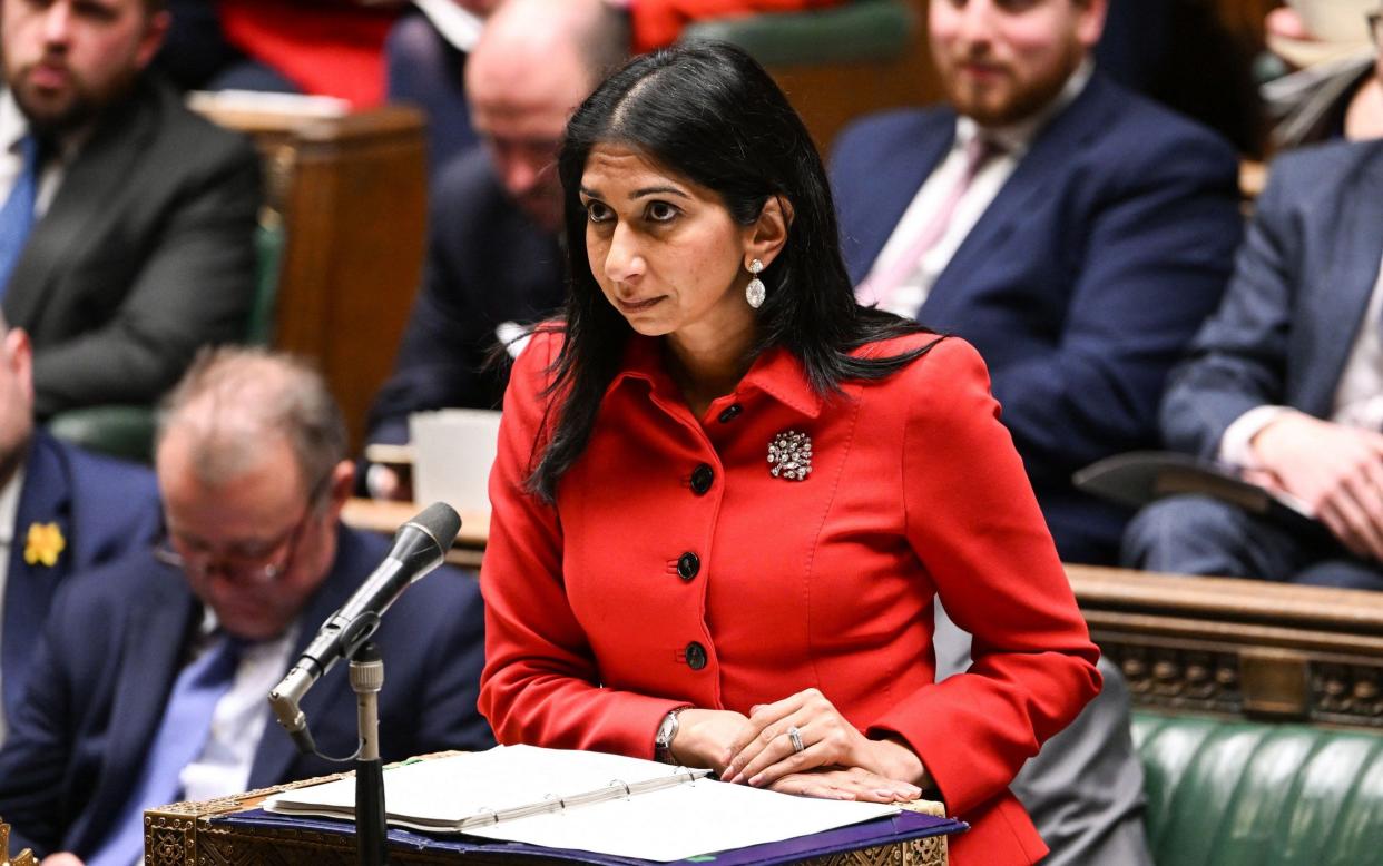 A handout photograph released by the UK Parliament shows Britain's Home Secretary Suella Braverman giving a statement on the Illegal Migration Bill in the House of Commons in London, on March 7, 2023. - The UK government Tuesday unveiled radical plans to stop migrants crossing the Channel illegally on small boats, acknowledging it is stretching international law amid an outcry from rights campaigners. - ANDY BAILEY/AFP