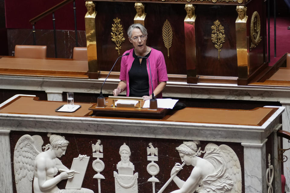 French Prime Minister Elisabeth Borne delivers a speech at the National Assembly, in Paris, France, Wednesday, July 6, 2022. Borne lay out her main priorities at parliament after the government lost its straight majority in the National Assembly in elections last month. (AP Photo/Christophe Ena)