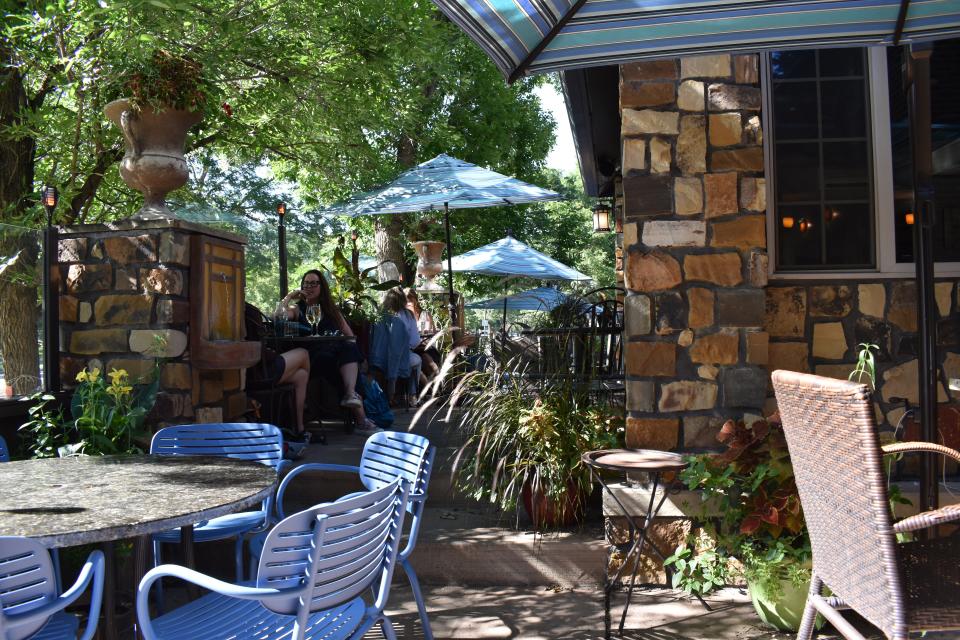 Cafe Vino's cozy patio boasts comfy nooks and crannies, firepits, fountains and lush planters.