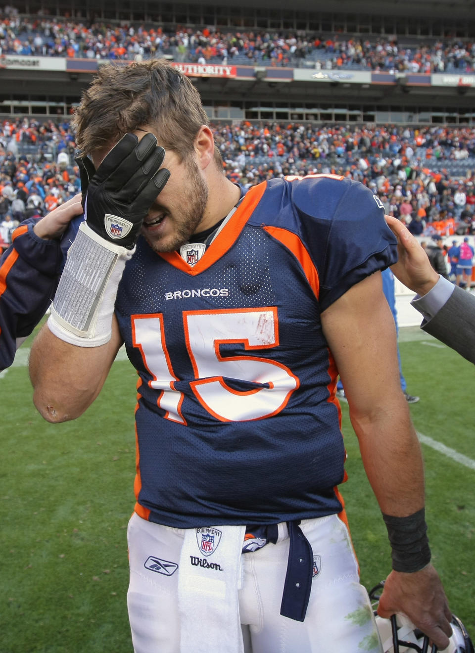 DENVER, CO - OCTOBER 09: Quarterback Tim Tebow #15 of the Denver Broncos reacts after the Broncos were defeated 29-24 by the San Diego Chargers at Sports Authority Field at Mile High on October 9, 2011 in Denver, Colorado. (Photo by Doug Pensinger/Getty Images)