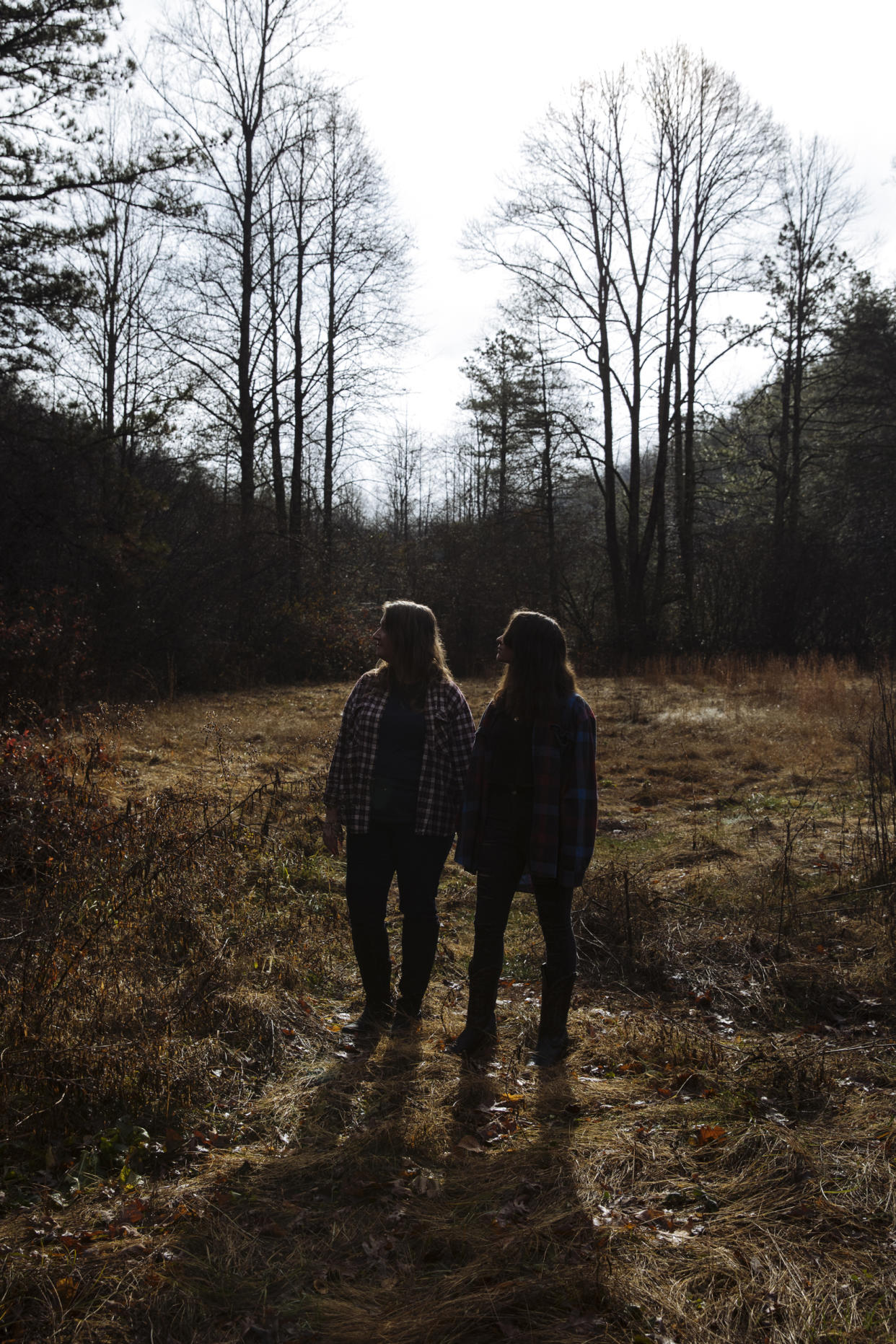 Marcella and her daughter Riley, 15, at their home in Cherokee County, N.C., on Dec. 4, 2022. Riley was sexually assaulted and later harassed by her fellow students at Andrews Middle School in Andrews, N.C. (Kendrick Brinson for NBC News)