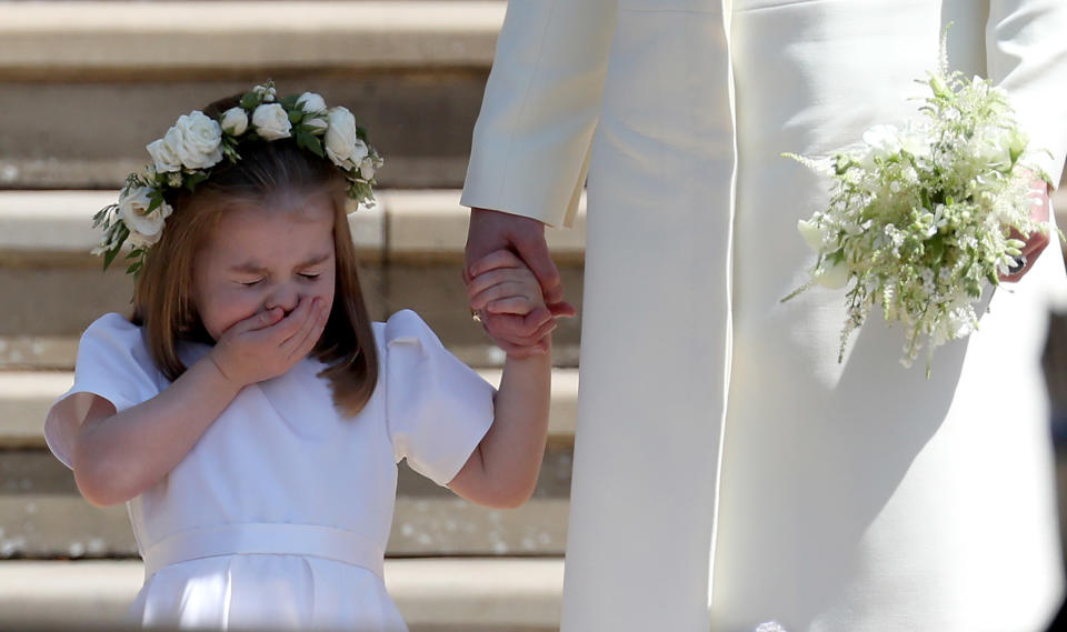 <p>Charlotte's sneeze was caught as she stood outside St George's Chapel after Prince Harry's wedding. (WPA Pool/Getty Images)</p> 