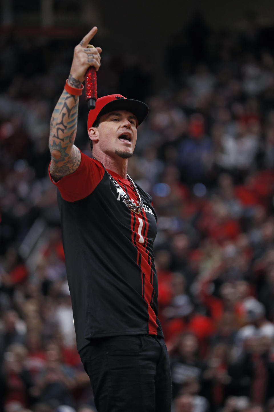 Vanilla Ice performs on stage during halftime of an NCAA college basketball game between Texas Tech and Iowa State, Saturday, Jan. 18, 2020, in Lubbock, Texas. (AP Photo/Brad Tollefson)