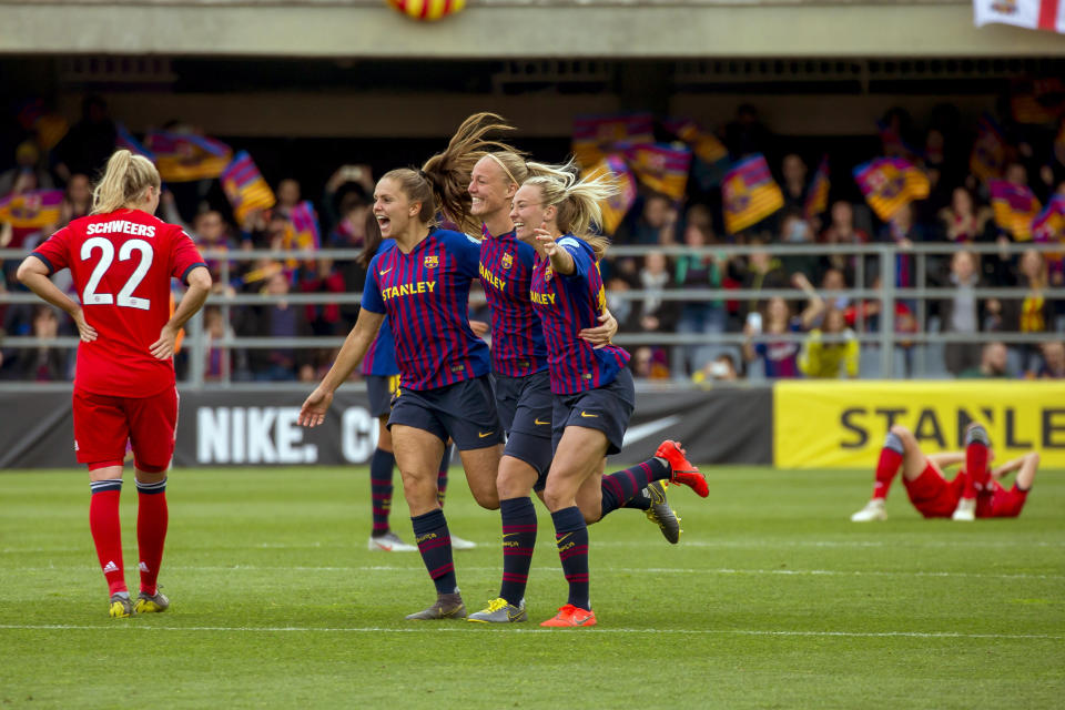 FC Barcelona players celebrate at the end of the Women's Champions League semifinal second leg soccer match between FC Barcelona and Bayern Munich at the Miniestadi stadium in Barcelona, Spain, Sunday, April 28, 2019. (AP Photo/Joan Monfort)
