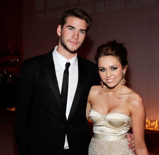 Liam Hemsworth and Miley Cyrus attend the 18th Annual Elton John AIDS Foundation Academy Award Party at Pacific Design Center on March 7, 2010, in West Hollywood, California.<p><a href="https://www.gettyimages.com/detail/97523329" rel="nofollow noopener" target="_blank" data-ylk="slk:Larry Busacca/Getty Images;elm:context_link;itc:0;sec:content-canvas" class="link ">Larry Busacca/Getty Images</a></p>