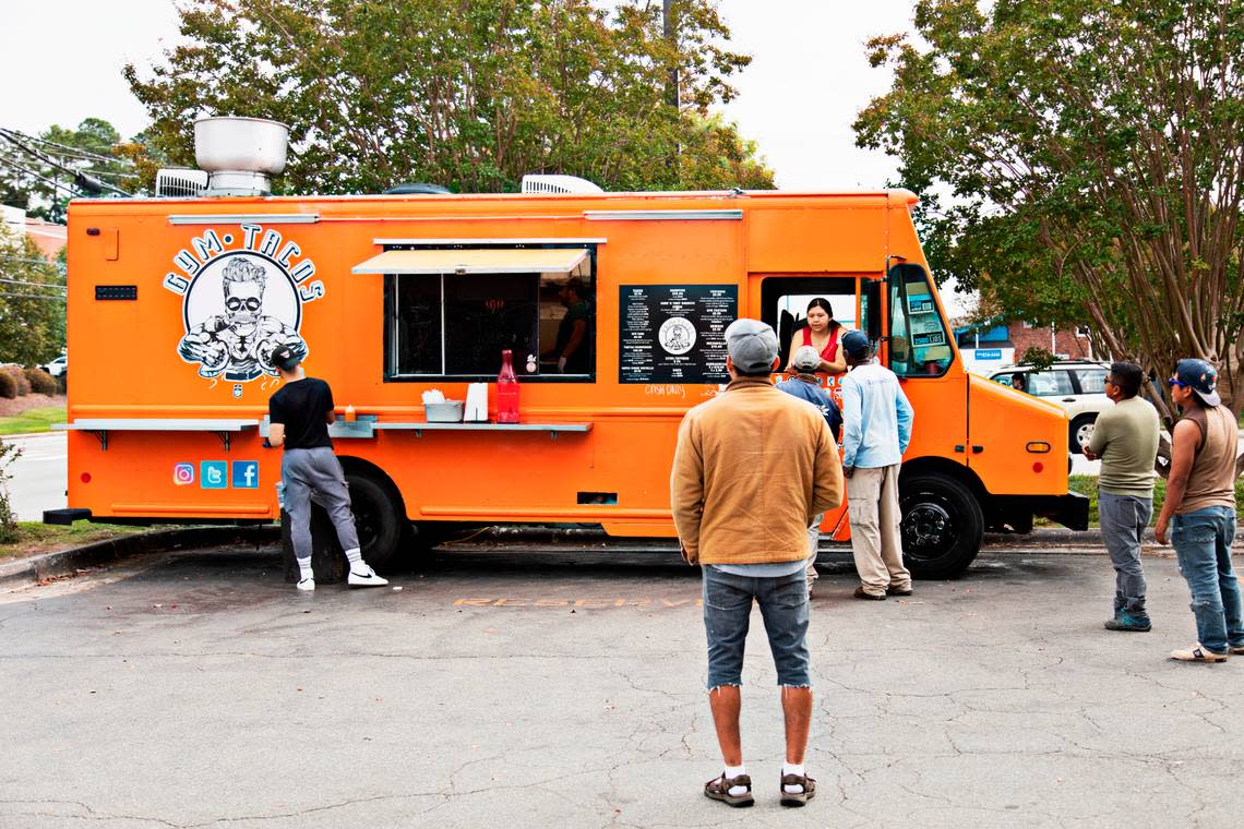 The Gym Tacos food truck gathers a line at lunch in Raleigh on Thursday, Sept. 30, 2021.