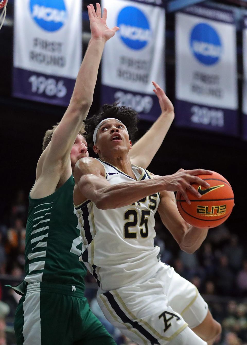 Akron Zips forward Enrique Freeman looks to score against Ohio, Tuesday, Jan. 23, 2024.