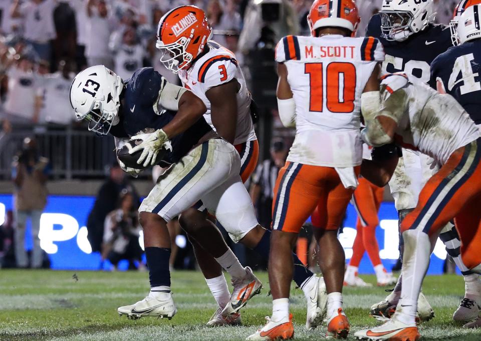 Sep 28, 2024; University Park, Pennsylvania, USA; Penn State Nittany Lions running back Kaytron Allen (13) scores a touchdown during the fourth quarter against the Illinois Fighting Illini at Beaver Stadium. Penn State defeated Illinois 21-7.