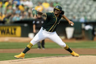 Oakland Athletics starting pitcher Sean Manaea works against the Houston Astros in the first inning of a baseball game in Oakland, Calif., Saturday, Sept. 25, 2021. (AP Photo/John Hefti)