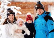 <p>The whole family posed for a photo in the snow during their break, too.</p>