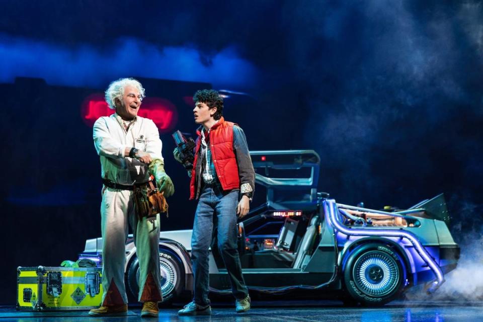 Roger Bart, left, and Casey Likes star in the Broadway production of “Back to the Future: The Musical.”