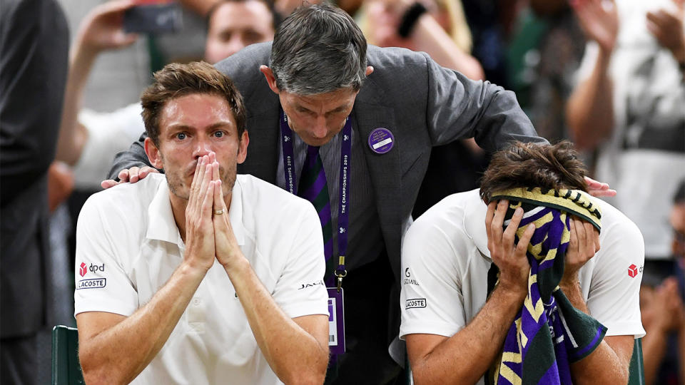 Edouard Roger-Vasselin of France and playing partner Nicolas Mahut of France react following defeat in their Men's Doubles final against Robert Farah of Colombia and Juan Sebastian Cabal of Colombia during Day twelve of The Championships - Wimbledon 2019 at All England Lawn Tennis and Croquet Club on July 13, 2019 in London, England. (Photo by Shaun Botterill/Getty Images)