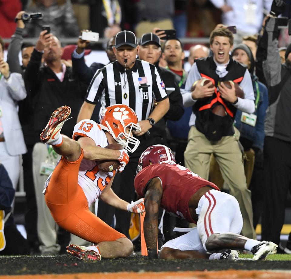 Clemson wide receiver Hunter Renfrow (13) catches the game-winning touchdown against Alabama defensive back Tony Brown (2) in the fourth quarter in the College Football Playoff championship game at Raymond James Stadium, Monday, Jan. 9, 2017.