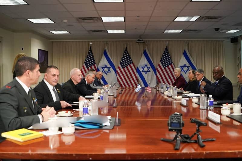 US Defence Secretary Lloyd Austin (R) and Israel's Defence Minister Yoav Gallant (3rd L) at the US Defence Department (the Pentagon) ahead of their meeting. Ariel Hermoni/ZUMA Press Wire/dpa