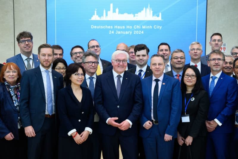 German President Frank-Walter Steinmeier (C) stands for a group photo with representatives of the German and Vietnamese business communities after lunch at the German House. President Steinmeier and his wife visit Vietnam and Thailand during a four-day trip to Southeast Asia. Bernd von Jutrczenka/dpa