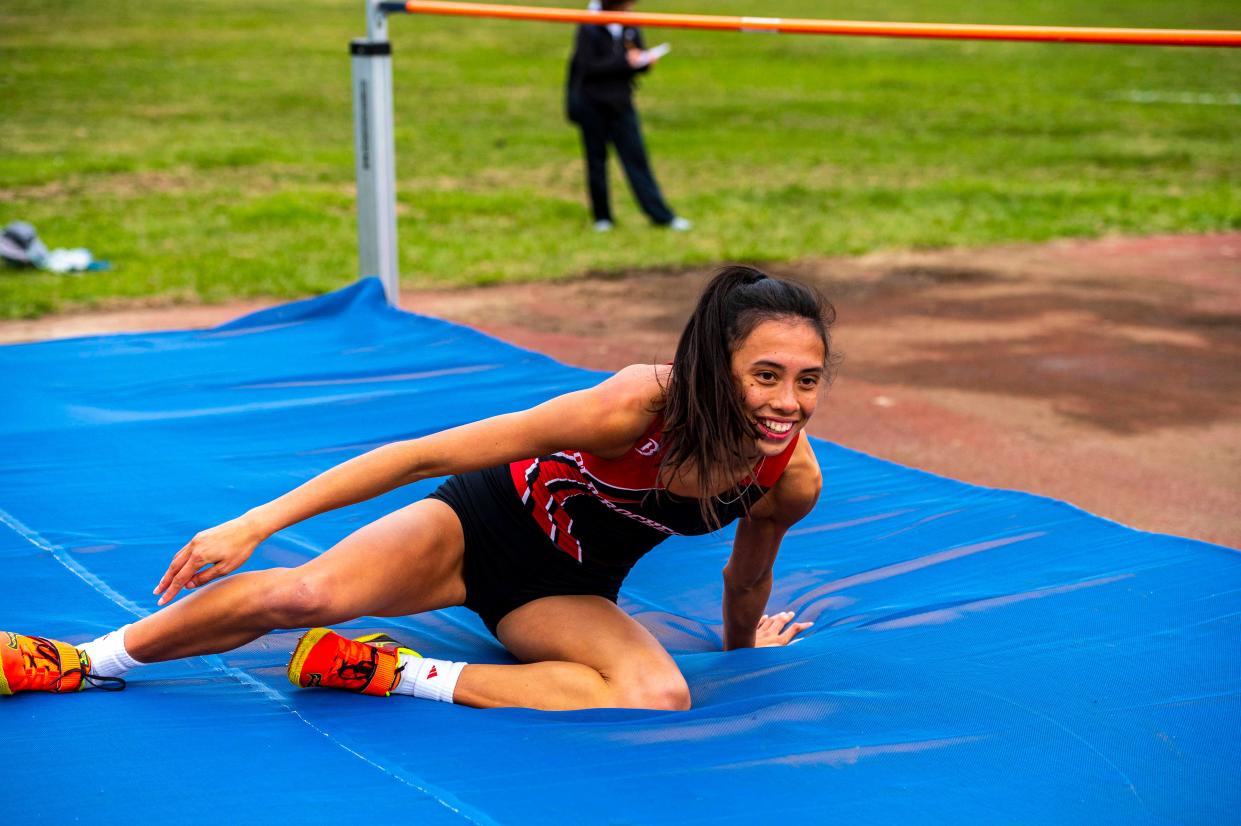 Old Rochester's Maggie Brogioli is all smiles after clearing the bar.