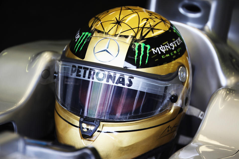 Schumacher wearing a specially designed gold drivers helmet as he commemorates the 20th anniversary of his first F1 race during practice for the Belgian Formula One Grand Prix at the Circuit of Spa Francorchamps in 2011. (Getty)