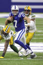 Indianapolis Colts quarterback Philip Rivers (17) scrambles with the ball in an NFL game against the Green Bay Packers, Sunday, Nov. 22, 2020 in Indianapolis. The Colts defeated the Packers 34-31. (Margaret Bowles via AP)