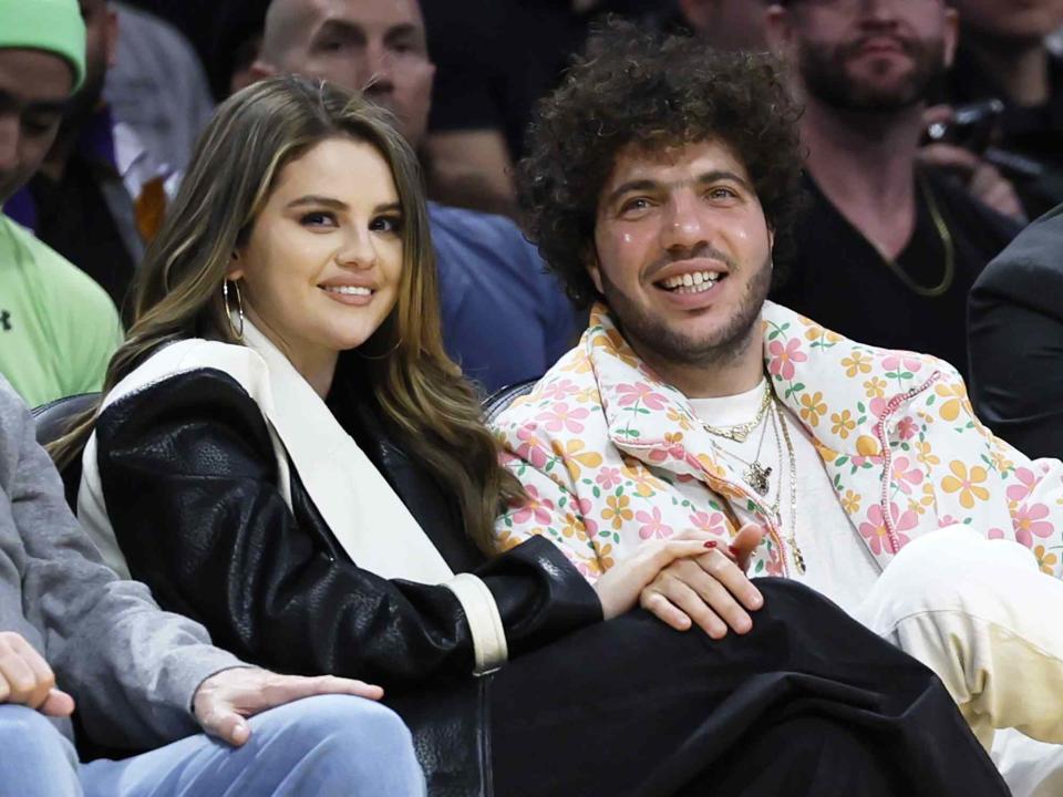 <p>Allen J. Schaben / Los Angeles Times / Getty</p> Selena Gomez and Benny Blanco during the first half of a Los Angeles Lakers game on January 3, 2024.