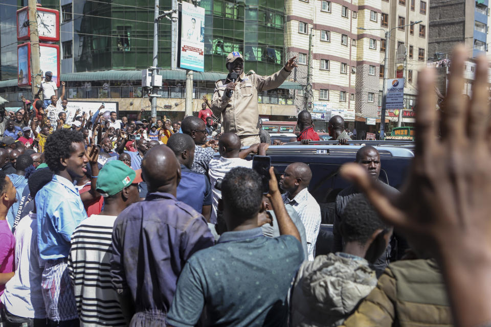 Kenyan opposition leader Raila Odinga speaks to supporters on a street in the Eastleigh neighborhood of Nairobi, Kenya Monday, March 20, 2023. Hundreds of opposition supporters took to the streets of the Kenyan capital over the result of the last election and the rising cost of living, in protests organized by the opposition demanding that the president resigns from office. (AP Photo)