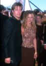 <p>You know I just <em>had </em>to include this Jennifer look from the '99 awards. She wore a sleeveless dress with an embellished bodice and brown skirt, and, of course, her tousled braided hair. </p>