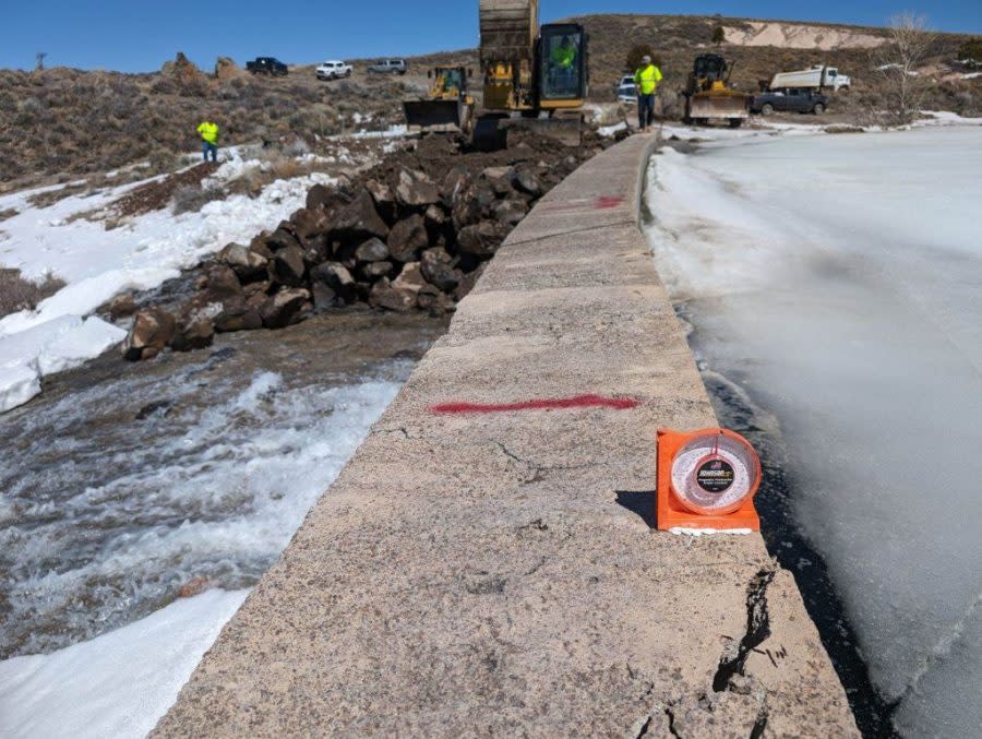 Crews work to relieve pressure at the Panguitch Lake Dam (Courtesy: Utah Department of Public Safety)