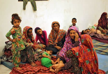 Villagers sit inside a relief camp after they evacuated their village near the border with Pakistan in Ranbir Singh Pora, southwest of Jammu, September 30, 2016. REUTERS/Mukesh Gupta