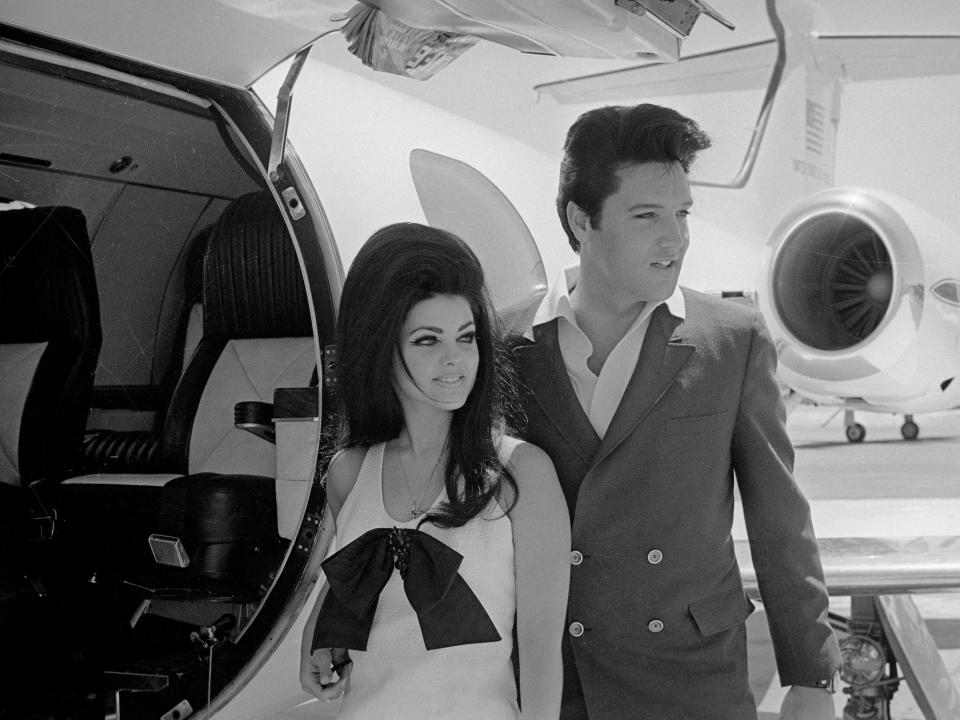 Newlyweds Elvis and Priscilla Presley prepare to board their private jet following their wedding at the Aladdin Resort and Casino in Las Vegas.