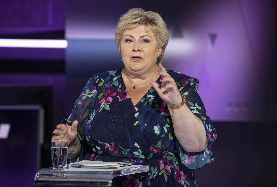 FILE - In this Tuesday, Aug. 31, 2021 file photo, Norwegian Prime Minister and Conservative Party leader Erna Solberg speaks during the party leader debate on TV2, in Bergen, Norway. As Norwegians head to the polls on Monday, Sept. 13, fears about climate change have put the future of the North Sea oil and gas industry at the top of the campaign agenda. The ruling Conservatives, led by Prime Minister Erna Solberg, and the opposition Labor Party, which is leading in opinion polls, both advocate for a gradual move away from the fossil fuels that continue to underpin the economy. (Marit Hommedal/NTB via AP, file)