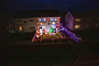 A mum has gone all out to cheer up her kids and neighbours by putting up her CHRISTMAS decorations three months early - including 3,000 outdoor lights. Caroline Gabe, 46, has been shielding with her children since March - and said putting up her tree and decorations in September was a much-needed boost. She has spent the year buying outdoor lights and installations - from as far away as America - and put them all up last week, on a whim. Almost all of them are outside - including 3,000 fairy lights, sparkling snow, an 8ft inflatable snowman, as well as Santa and his reindeer.