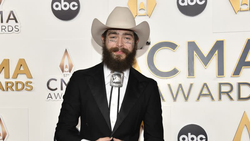 Post Malone arrives at the 57th Annual CMA Awards on Wednesday, Nov. 8, 2023, at the Bridgestone Arena in Nashville, Tenn. 