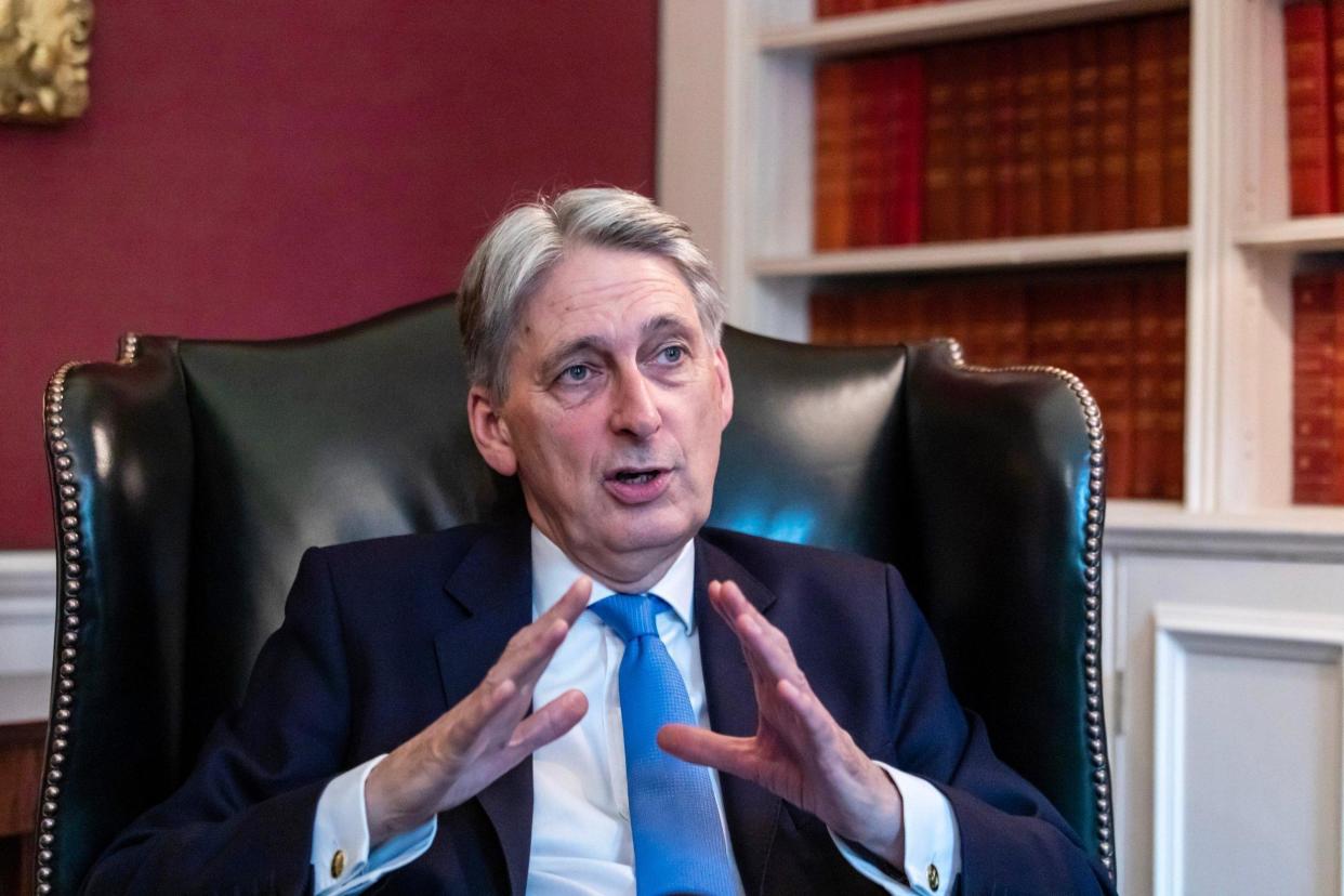 Philip Hammond said Theresa May should be replaced "as quickly as possible": Alex Lentati