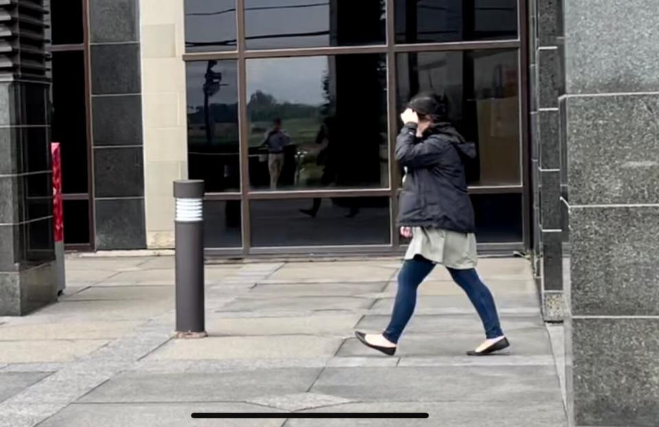 Bianca Chouinard of Campbellton leaves Moncton provincial court on Tuesday.