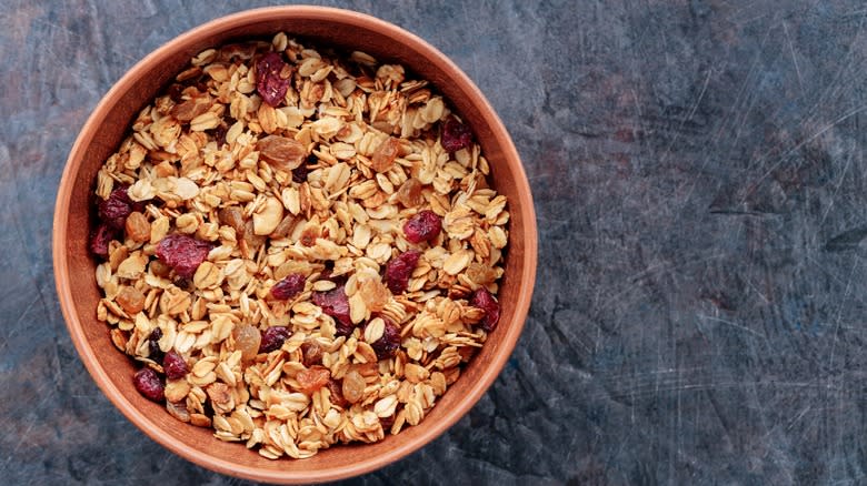 Bowl of granola grey background