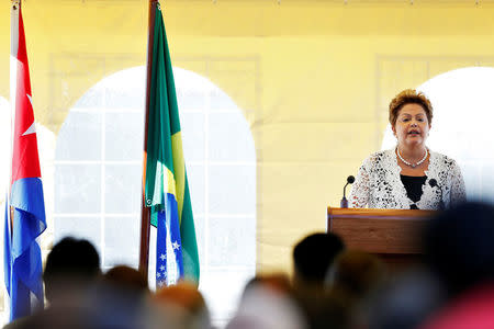 Brazil's President Dilma Rousseff addresses regional leaders in Cuba for a Latin American and Caribbean summit during the inauguration of a port in Mariel on the outskirts of Havana in this January 27, 2014 file photo. REUTERS/Claudia Daut/File Photo