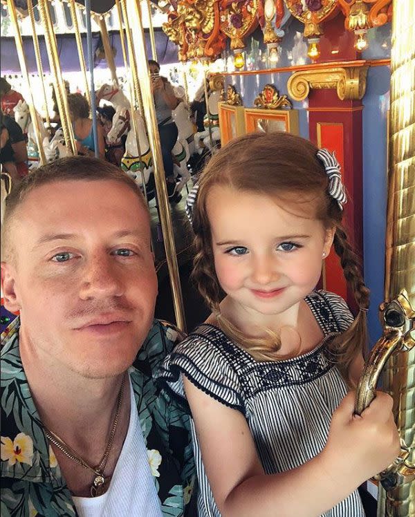 <p>"Disneyland life," the Seattle rapper captioned this sweet snap with his daughter, Sloane Ava Simone, 3, on what looks like the King Arthur Carousel in Fantasyland. He and wife Tricia Davis welcomed a second daughter in March.</p>