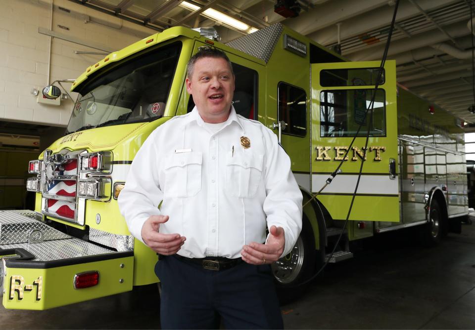 New Kent Fire Chief James Samels talks about his new job while giving a tour of Station 1 in Kent on Tuesday, Feb. 27, 2024. Samels is standing in front of the department's newest truck, Rescue 1.