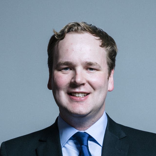 Headshot of William Wragg smiling