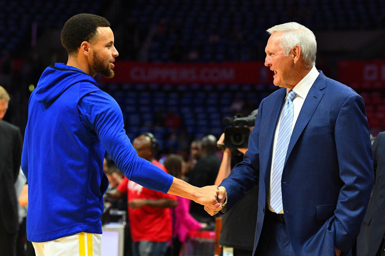 LOS ANGELES, CA - APRIL 18: Golden State Warriors Guard Stephen Curry (30) talks with Executive board member of the Los Angeles Clippers Jerry West before game three of the first round of the 2019 NBA Playoffs between the Golden State Warriors and the Los Angeles Clippers on April 18, 2019 at Staples Center in Las Angeles, CA. (Photo by Brian Rothmuller/Icon Sportswire via Getty Images)