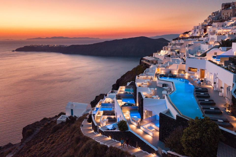 Exterior of Grace Hotel in Santorini lit up at night