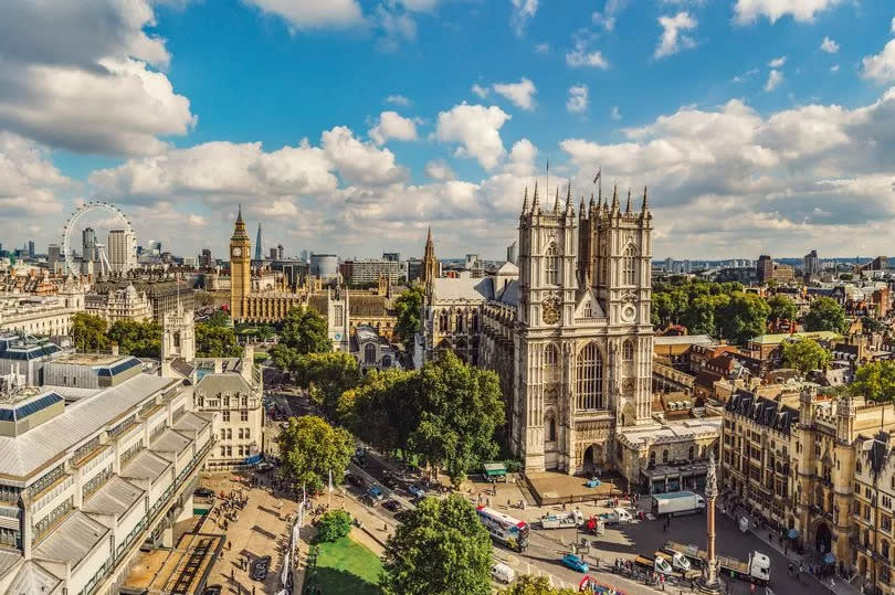 A high level view overlooking Westminster Abbey. Major sights included in this view are Westminster Abbey, Big Ben and Houses of Parliament, Shard, Canary Wharf and the Supreme Court.