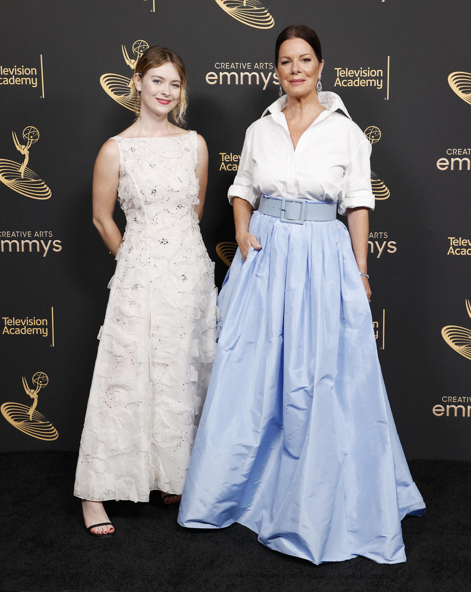 Julitta and Marcia in gowns on the red carpet
