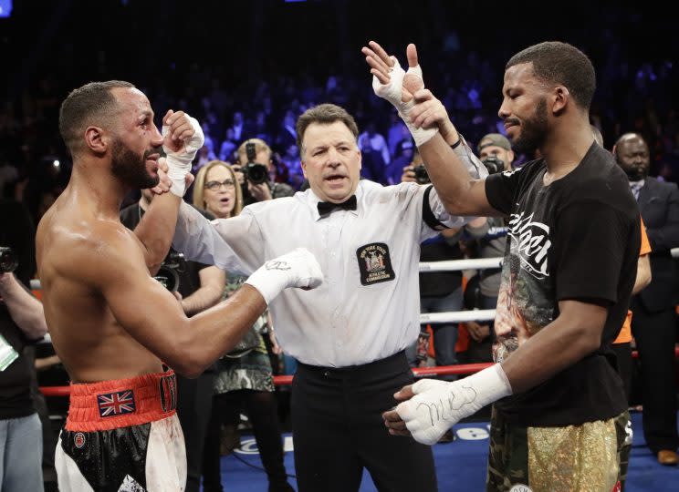 James DeGale (L), referee Arthur Mercante and Badou Jack (R) react after their WBC-IBF super middleweight unification fight was called a draw. (The Associated Press)