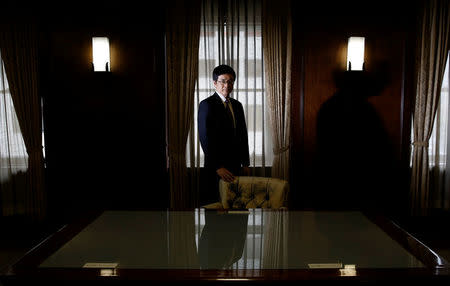 Dai-ichi Life Holdings Inc's incoming president Seiji Inagaki poses for a photo in the MacArthur memorial room at the company's headquarters in Tokyo, Japan March 13, 2017. Picture taken March 13, 2017. REUTERS/Toru Hanai