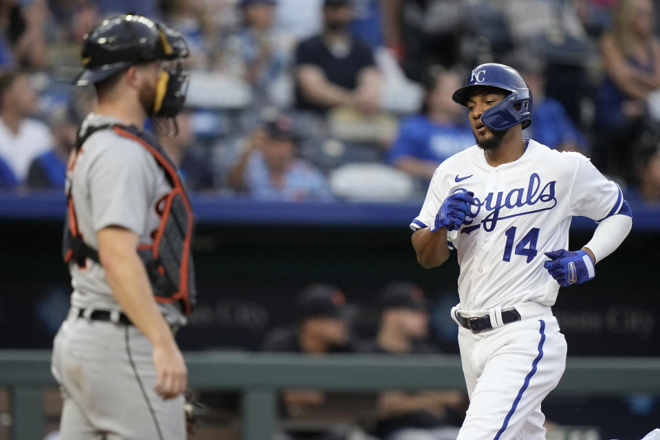 Kansas City Royals' Edward Olivares (14) runs home to score on a triple by Drew Waters during the fourth inning of a baseball game against the Detroit Tigers Tuesday, July 18, 2023, in Kansas City, Mo. (AP Photo/Charlie Riedel)