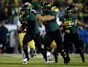 EUGENE, OR - DECEMBER 02: LaMichael James #21 of the Oregon Ducks breaks away for a touchdown run against the UCLA Bruins during the Pac 12 Championship Game on December 2, 2011 at the Autzen Stadium in Eugene, Oregon. (Photo by Jonathan Ferrey/Getty Images)