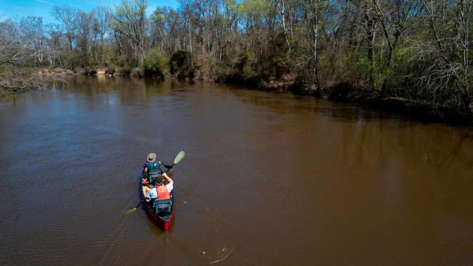 News & Observer reporter Josh Shaffer and his friend Mark Lindblad paddle the Tar River near Tarboro.