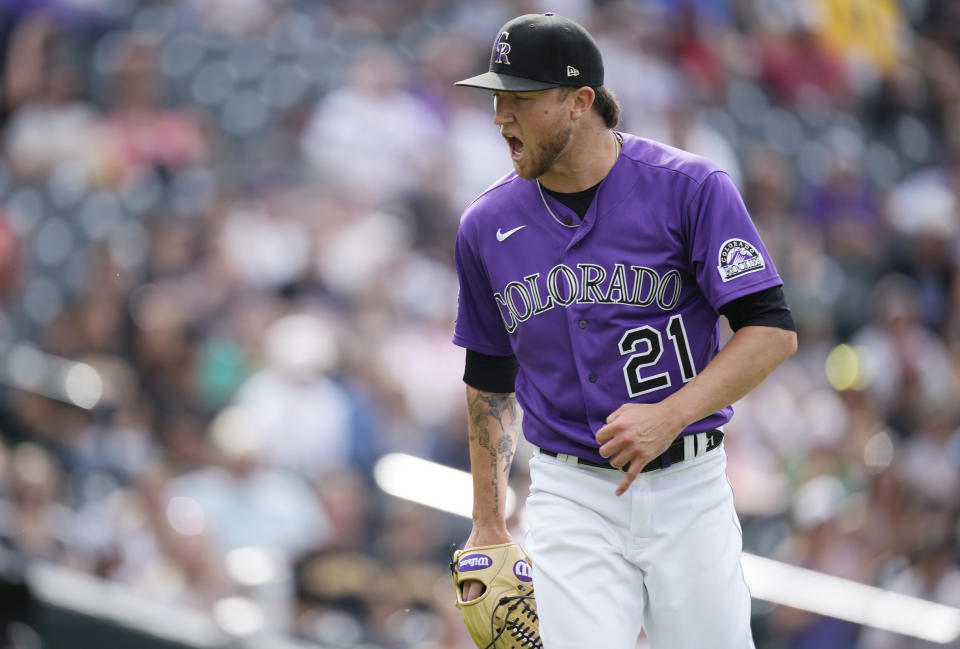 Colorado Rockies starting pitcher Kyle Freeland reacts after getting Pittsburgh Pirates' Ke'Bryan Hayes to ground out to end the top of the fifth inning of a baseball game Monday, June 28, 2021, in Denver. (AP Photo/David Zalubowski)