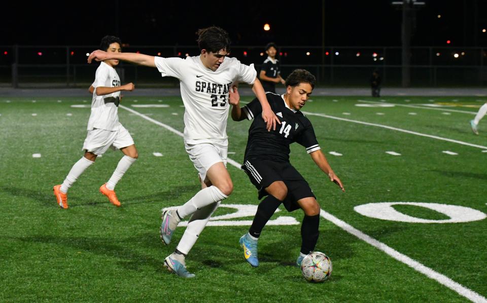 Rio Mesa's Luis Gonzalez (left) and Pacifica's Bryant Martinez battle for the ball during the teams' 1-1 draw in a Channel League match on Thursday, Jan. 11, 2024.